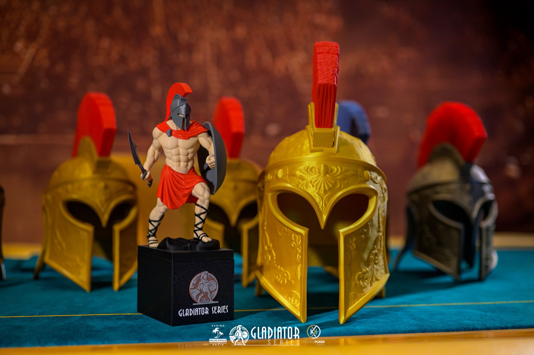 The gladiator statuette and helmets